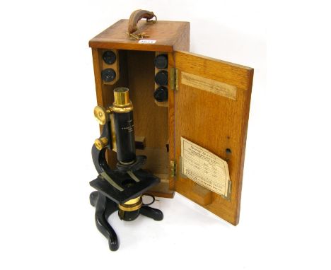 Antique microscope inscribed 'Kina', W Watson & Sons Limited, London no. 60508, within a fitted light oak case with spare len