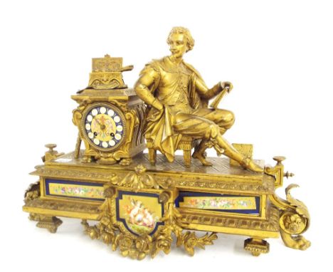 Gilded spelter porcelain panelled two train figural mantel clock striking on a bell, the 3.5" porcelain dial within a pedesta