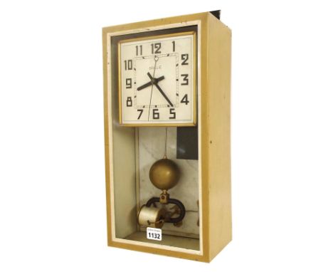 Brillie electric wall clock, the 6" square silvered dial with sweep seconds hand and within a glazed light brown metal case w