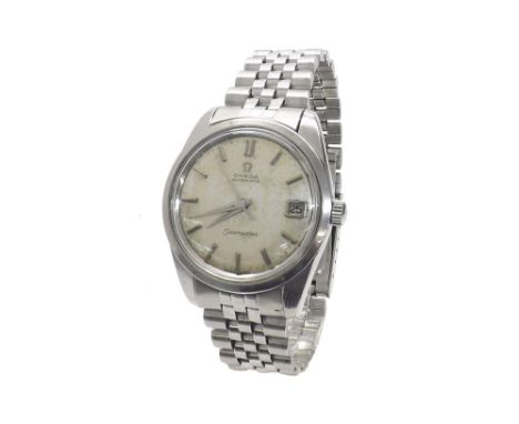 (W3Q7DJ) Omega Seamaster automatic stainless steel gentleman's bracelet watch, circa 1964, the silvered dial with baton marke