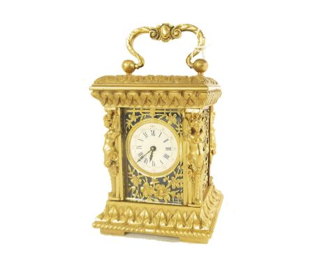 Fine miniature ormolu and blue enamel clock timepiece, the 1" dial within a pierced foliate mask with similar panels to the s