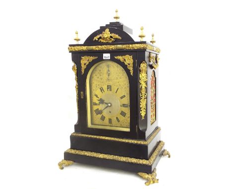 English ebonised boardroom triple fusee mantel clock, the substantial movement playing on a nest of eight bells and five grad