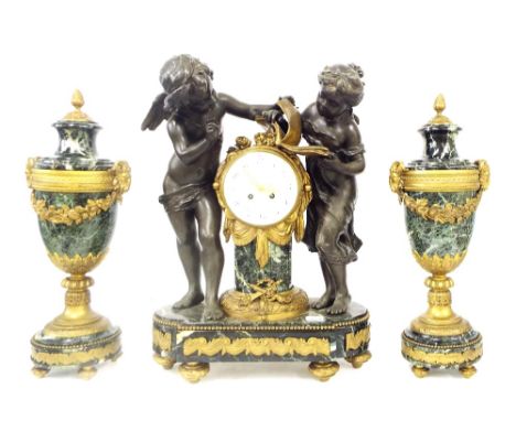 Impressive large decorative green marble and spelter figural two train mantel clock garniture, the movement with outside coun