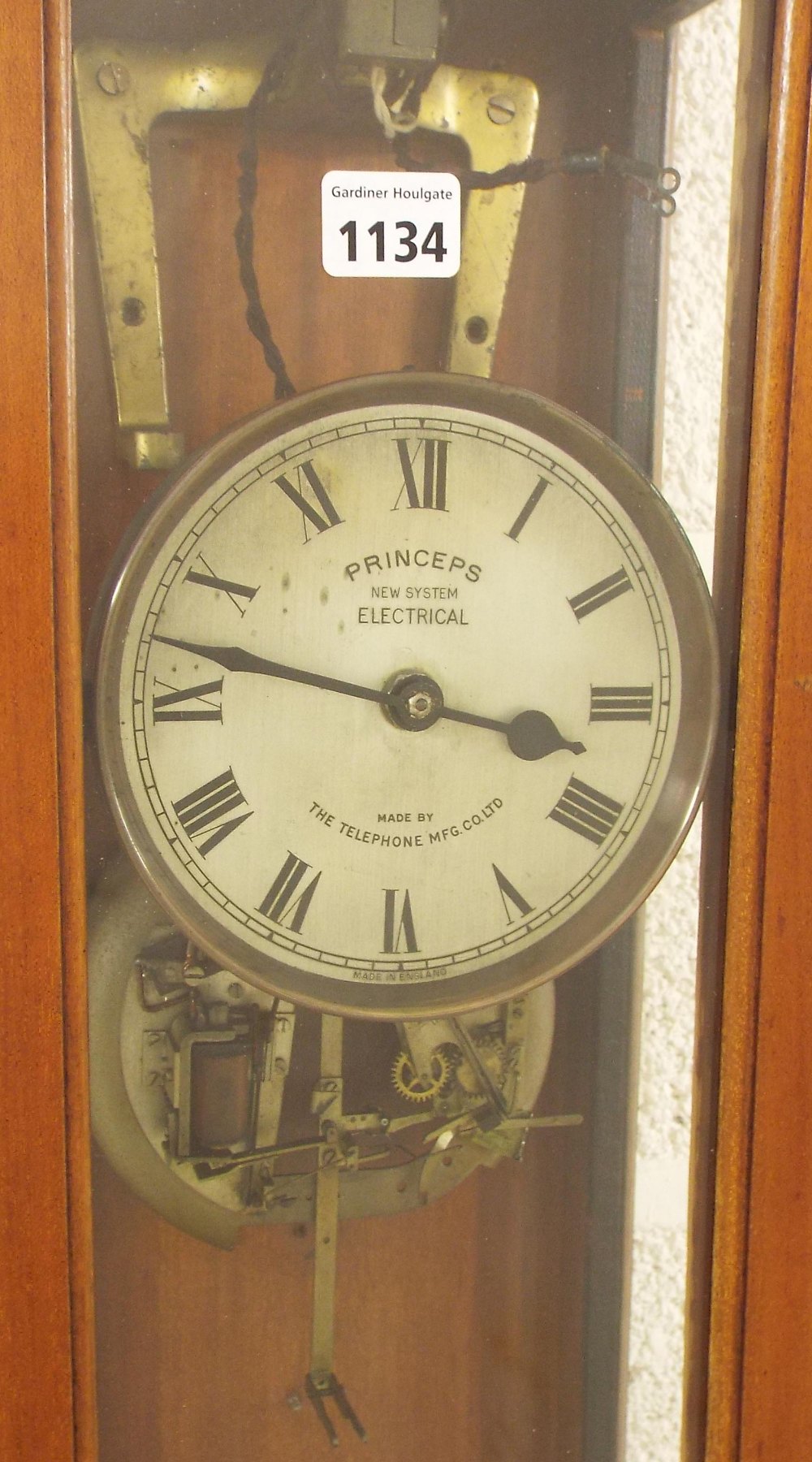 Good mahogany electric master clock, the 5.25" silvered dial signed