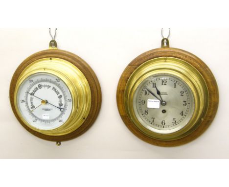 Brass bulkhead single train wall clock, the 5.5" silvered dial signed Barker, Kensington within a bulkhead surround upon a tu