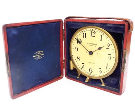 Interesting brass night clock, the 4.5" dial signed H.W Bedford, 67 Regent Street, London, within a brass surround and stand,
