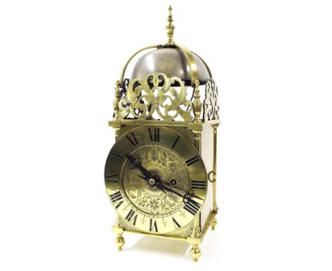 Good contemporary brass single fusee lantern clock, the 6.5" brass chapter ring enclosing a foliate engraved centre, surmount