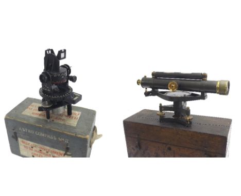 WWII Astro compass Mk II, within the original Military fitted wooden box; also a theodolite instrument within a mahogany box 