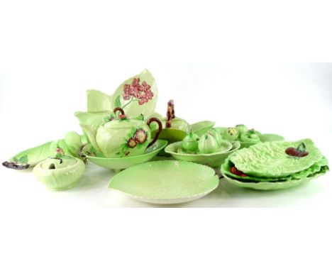 A collection of Carltonware leaf moulded items, each decorated with flowers etc., to include a basket, small teapot, toast ra