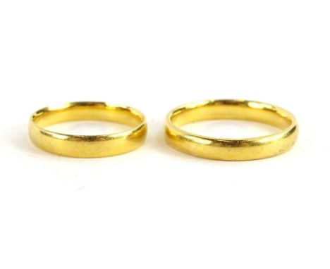 Two 22ct gold wedding bands, ring sizes P &amp; K, 7.1g. 