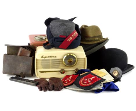 A collection of items, to include a portable radios, various hats to include Salvation Army hat, leather items etc.