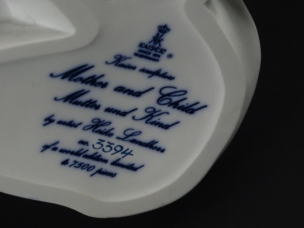 A Kaiser porcelain limited edition figure of a mother and child, number 3394/7500, printed marks