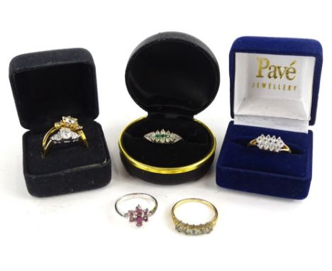 Six various gem set rings, to include a silver cluster ring, and five imitation gold dress rings, each of varying design, wit