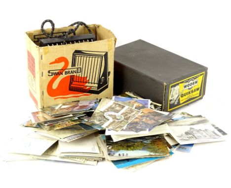 A Swan brand vintage electric toaster, and a Wolden Quick Saw both in original box, and various postcards.