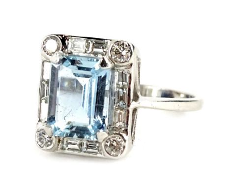 An aquamarine and diamond ring, in the Art Deco style, with central rectangular cut aquamarine, 8.8mm x 6.6mm x 4.2mm, with f