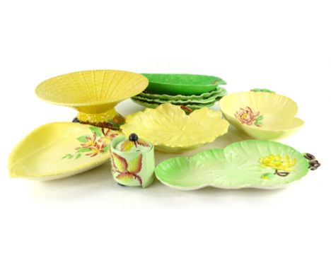 A collection of Carltonware and other leaf moulded pottery, to include yellow floral dishes, simulated basket, a green shaped