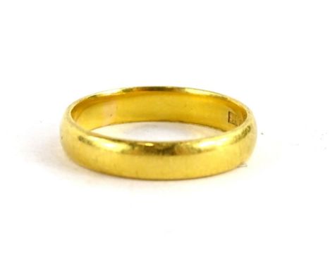 A 22ct gold wedding band, ring size P, 4.8g.
