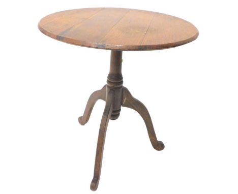 A 19thC oak occasional table, the circular top on a turned column and tripod base, 49cm wide. 