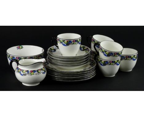 A Royal Doulton part tea service, decorated with Art Deco geometric bands, flowers etc., pattern number 1481.
