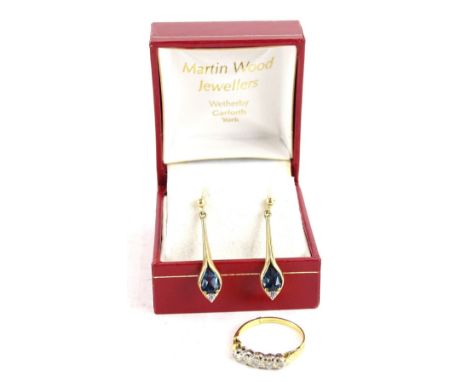 Two items of jewellery, to include a five stone diamond ring, on yellow metal band, unmarked, together with a pair of blue an