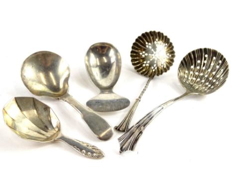 Three silver caddy spoons, to include London 1828, Sheffield 1920 and Sheffield 1926, and two silver sifter spoons, 2¼oz over