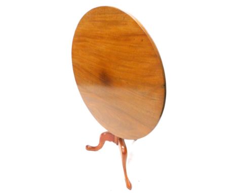 A mahogany tilt top breakfast table, with a circular top, and turned column with tripod base, 83cm dia.