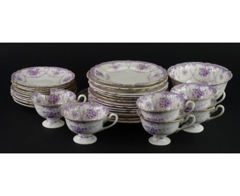 A Shelley part tea service, decorated with baskets of flowers in purple, pattern number 9298, bearing registration number.
