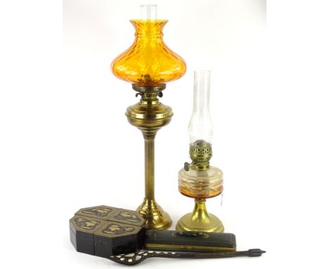 A collection of items, to include a tribal mother of pearl and brass inlaid spoon, a leather glove box, four lacquered insert