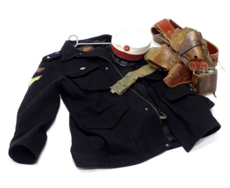 A collection of American leather holsters, a pair of binoculars, a top man jacket and trousers converted into an Army type un