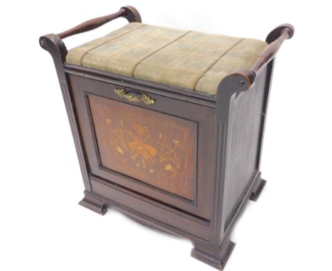 An Edwardian mahogany and marquetry music stool, with a padded seat above four front drawer enclosing a compartment for sheet