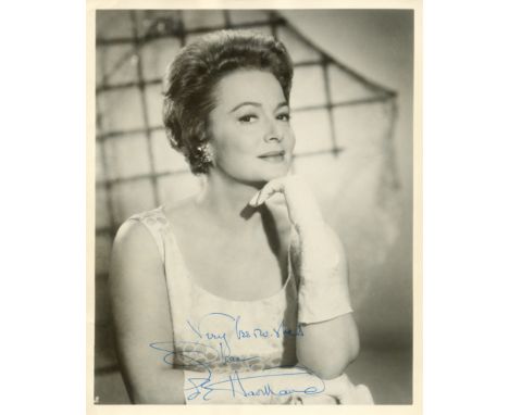 HAVILLAND OLIVIA DE: (1916- ) American Actress. Academy Award winner. Attractive vintage signed 8 x 10 photograph by Havillan