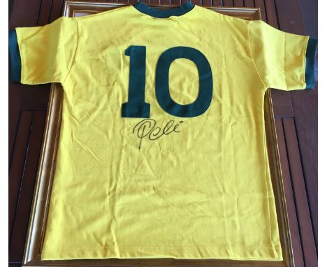 PELE: (1940- ) Brazilian Footballer. A retro Brazil gold and green cotton football jersey, with embroidered CBD (Confederação