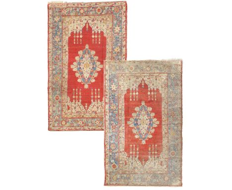 Rare Double Sided Anatolian Angora Rug, circa 1900Side A: the crimson field centred by a turquoise diamond medallion enclosed