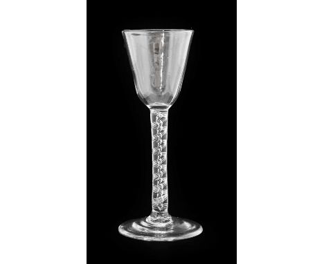 A Wine Glass, circa 1745, the rounded funnel bowl on an air twist stem16cm highNo chips, cracks or re polishing. Some light s