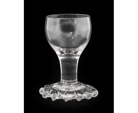 A Dram Glass, circa 1750, the ovoid bowl on a plain stem and overstrung foot9cm highNo chips, cracks or re polishing. Some li