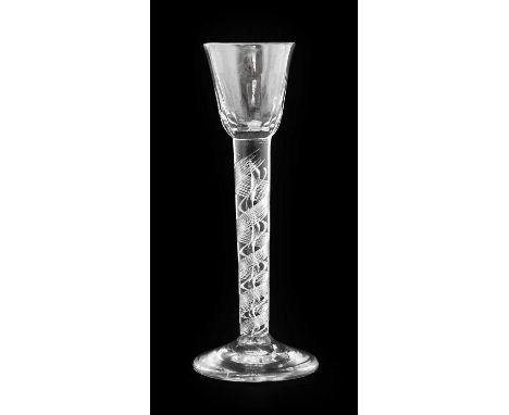 A Cordial Glass, circa 1750, the semi-fluted rounded funnel bowl on an air twist stem17cm highNo chips, cracks or re polishin