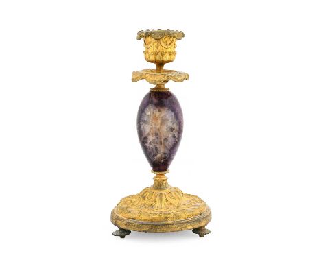 A Gilt-Metal-Mounted Blue John Candlestick, 19th century, the campana sconce with detachable nozzle, on an ovoid stem and dom