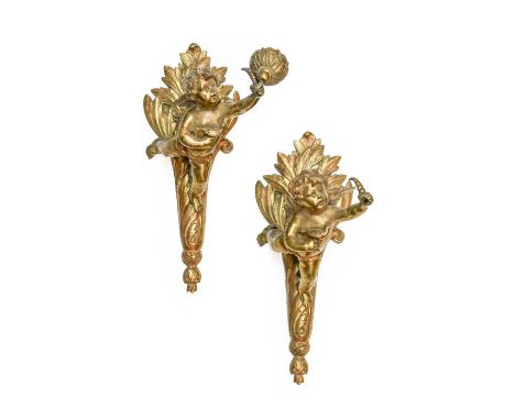 A Set of Seven Gilt Metal Pendant Light Fittings, 20th century, each modelled as a flying wing putto suspended from a circula