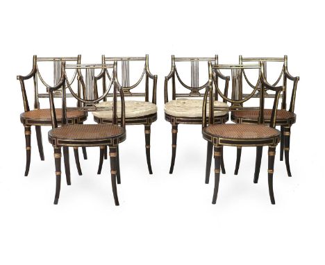 A Set of Six Regency Simulated Rosewood and Parcel-Gilt Armchairs, early 19th century, three stamped John Gee, the other thre