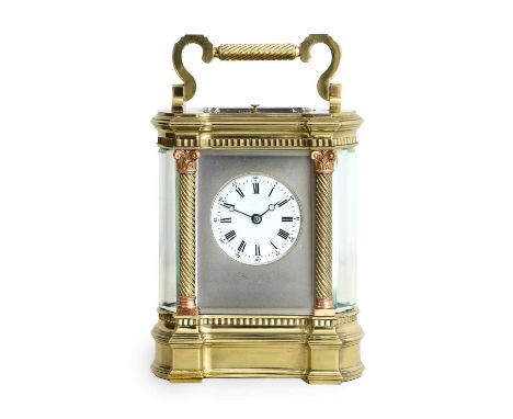 A Good Brass Strike and Repeat Carriage Clock, circa 1890, case with bow sided bevelled glass panels, carrying handle and rep