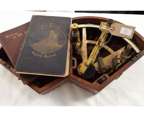 A 19thC brass sextant having ivory inlaid measuring arc, extra lenses housed in a mahogany box with Charles W Thompson F.R.G.