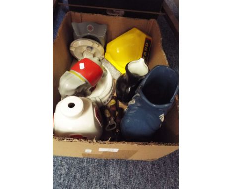 A selection of Breweriana to include Fremlins elephant, ashtrays, Double Diamond lamp and Guiness bottle openers