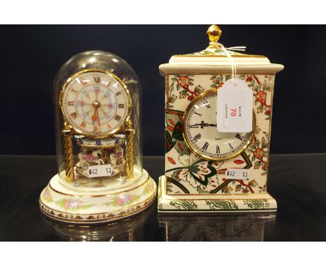 A Masons clock and anniversary clock