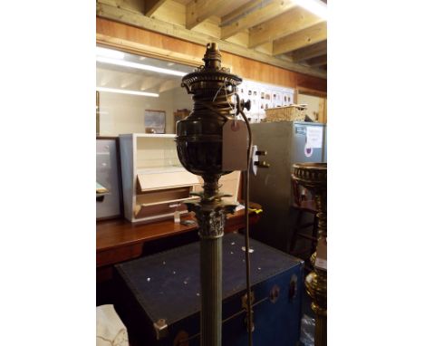 A Victorian heavy brass oil lamp stand of Corinthian column form converted to electricity 