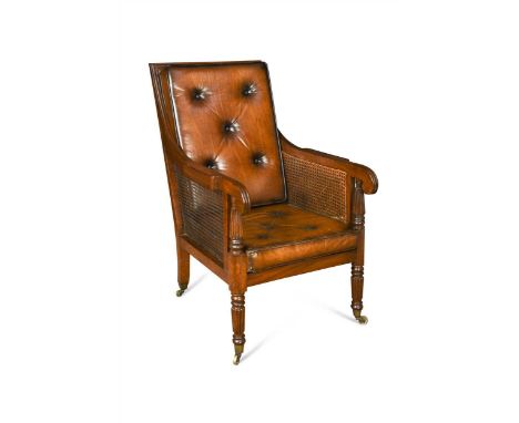 with buttoned leather squab cushions, on gadroon moulded legs and brass casters 99 x 62 x 80cmCondition report: Has been re-c