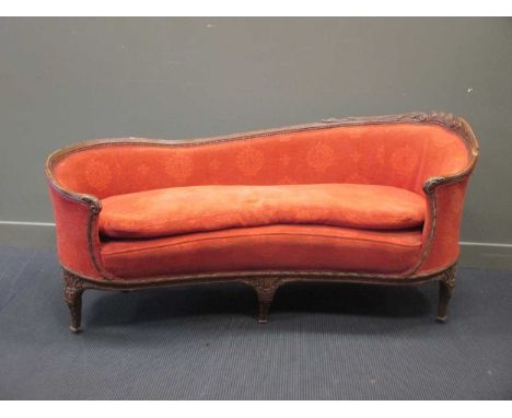 A French carved beechwood frame sofa with shaped back on cabriole front feet, 180cm wide