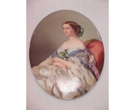 A porcelain plaque painted with a portrait of the Empress Eugenie (1826-1920) after Franz Winterhalter (1805-73), she sits wi