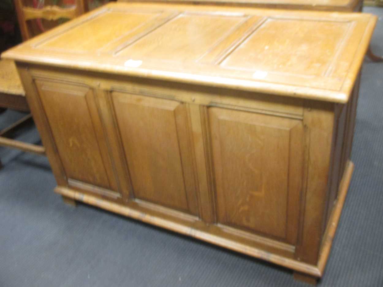 A modern oak blanket chest, 62 x 99 x 53cm, and a side 62 x 88