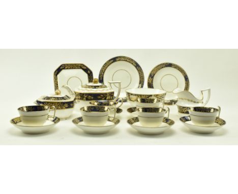 An early 19th century circa 1820 Spode part tea service in the Etruscan design. The service of white ground, with gilt acanth