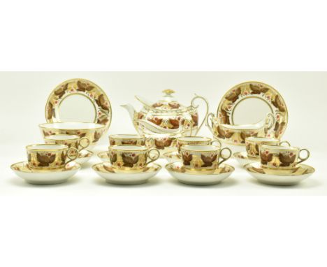 An early 19th century circa 1805-1810 Barr, Flight &amp; Barr porcelain part tea service in the brown grape vine design. The 